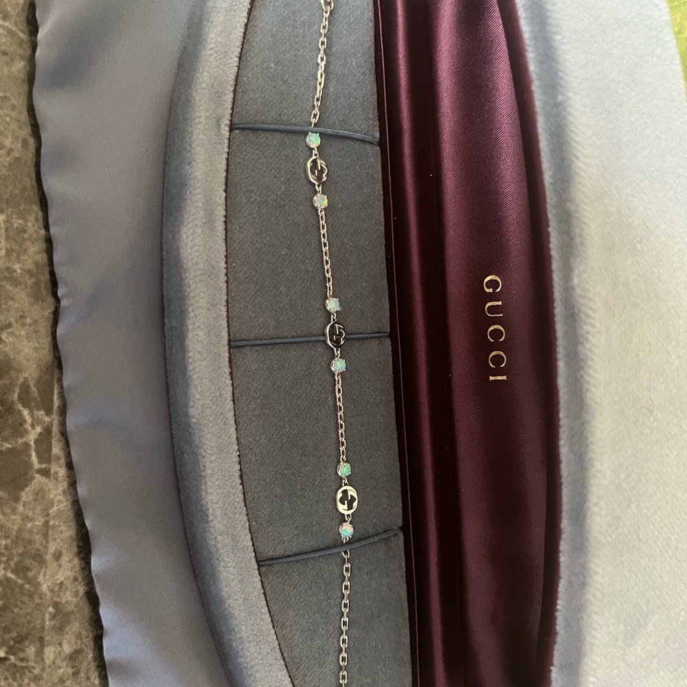 Gucci white gold/opal interlocking bracelet